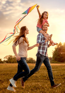 A family flying a kite in Bend.