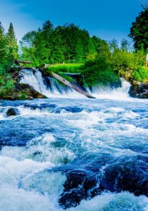 Keywords: river, waterfall

Modified Description: A picturesque river featuring a stunning waterfall.