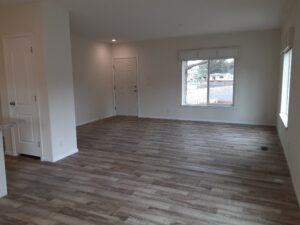Space #28 is ready for you with a wood floor and a window.